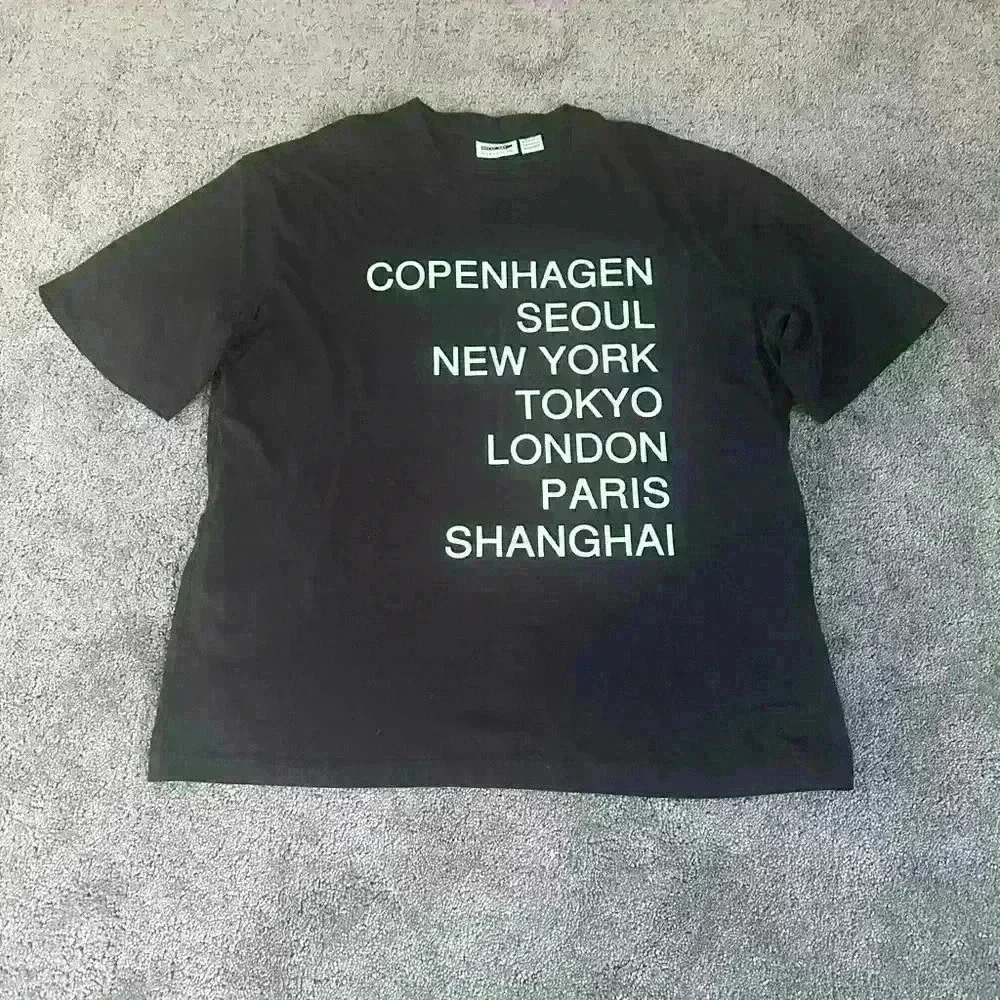 Noisy may Black Graphic Tee with White City Text